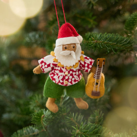 Craftspring’s Tropical Santa Ornament displayed on a Christmas tree — a festive and playful heirloom ornament, perfect for holiday gifting, ethically crafted by artisans using sustainable wool.