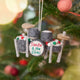 Christmas Drum Set Ornament from Craftspring displayed on a Christmas tree — handmade felt holiday decor with embroidered “Santa and the Elves” band name and intricate garland details, heirloom-quality ornament ethically crafted by artisans using sustainable wool.