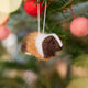 Craftspring’s Guinea Pig Ornament displayed on a Christmas tree—an adorable needle-felted treasure that brings warmth, joy, and heirloom-quality holiday gifting, ethically crafted by artisans using sustainable wool.