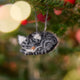 Craftspring’s Sleepy Gray Cat Ornament displayed on a Christmas tree—needle-felted with whiskers and a cute face, adding cozy holiday warmth and gifting charm, ethically crafted by artisans using sustainable wool.