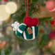 Craftspring’s Gift from the Heart Ornament displayed on a Christmas tree — felt ornament of a heart coming out of a present, with beaded and embroidered details, adding warm and festive holiday charm, ethically crafted by artisans using sustainable wool.