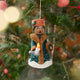 Caroler Holding a Candle Ornament from Craftspring — handmade felt holiday ornament with applique and embroidered snow, holding a candle, hanging on a Christmas tree, ethically crafted by artisans using sustainable wool.