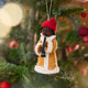 Caroler Playing the Clarinet Ornament from Craftspring — handmade felt holiday ornament with sweet facial details, intricate applique, and embroidered snow, hanging on a Christmas tree, ethically crafted by artisans using sustainable wool.