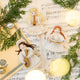 Craftspring’s Vintage-Style Angel Bundle with angels playing lute, playing trumpet, and singing Noel displayed together on sheet music — handmade felt holiday ornaments with sweet faces, intricate beaded and embroidered details, ethically crafted by artisans using sustainable wool for festive Christmas gifting.