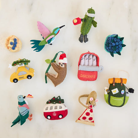 Craftspring’s Iconic Craftspring Ornaments Bundle — a collection of Craftspring bestsellers displayed together in a cozy holiday setting, highlighting a playful mix of favorite holiday designs, evoking festive warmth and heirloom-quality Christmas gifting, ethically crafted by artisans using sustainable wool.