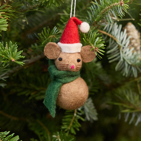 Craftspring’s Little Drop Santa Mouse Ornament displayed on a Christmas tree — felt mouse made of felt balls, wearing a Santa hat and green scarf, adding whimsical holiday charm and festive warmth — heirloom-quality Christmas decor, ethically crafted by artisans using sustainable wool.