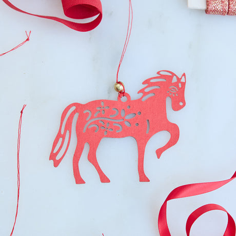 Craftspring’s Paper Horse Ornaments - Set of 3, displayed with bright red ribbon, highlighting their festive paper craftsmanship. Ethically handmade by artisans for meaningful Lunar New Year celebrations.