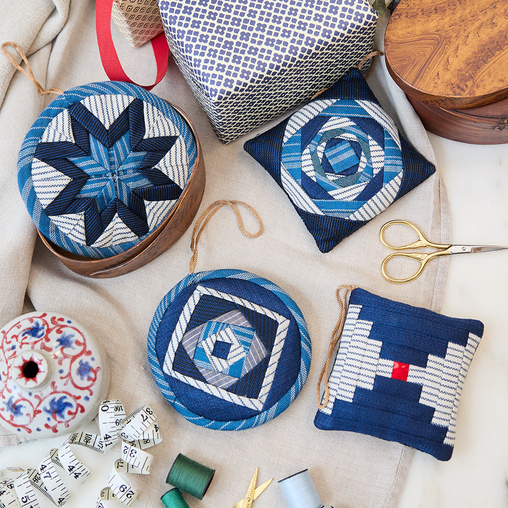 Handmade Indigo Quilted Ornaments, Set of 4, from Craftspring—displayed with quilting supplies, showcasing heirloom-quality Christmas decor, holiday crafting inspiration, and gifting, ethically handmade by artisans.