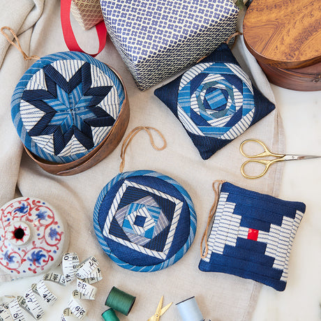 Handmade Indigo Quilted Ornaments, Set of 4, from Craftspring—displayed with quilting supplies, showcasing heirloom-quality Christmas decor, holiday crafting inspiration, and gifting, ethically handmade by artisans.