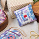 Ikat Quilted Ornament from Craftspring’s Set of 4 displayed among craft supplies—highlighting heirloom-quality quilting, festive holiday crafting, and thoughtful Christmas gifting, ethically handmade by artisans.