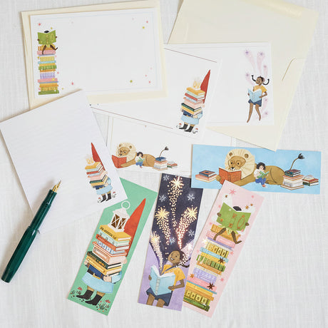 Collection of greeting cards and bookmarks with illustrations on a light background