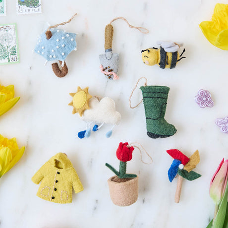 Handmade Felt Spring Nature Ornaments for Seasonal Displays, Nature Study &amp; Garden Gifts

Celebrate the discoveries of early spring with our Spring Splash Mini Ornaments – Set of 8, a cheerful collection inspired by spring weather, garden tools, pollinators, and woodland discoveries.