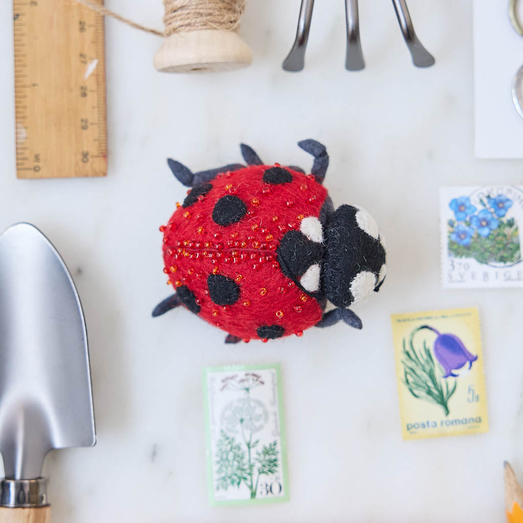 We’ve got a soft spot for this lucky little ladybug! Our Ladybug Ornament is lovingly hand needle-felted from natural wool, capturing the playful spirit of one of the garden’s most beloved insects.