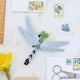 Celebrate the magic of spring with our Dragonfly Ornament, inspired by the graceful Eastern Pondhawk female dragonfly. 