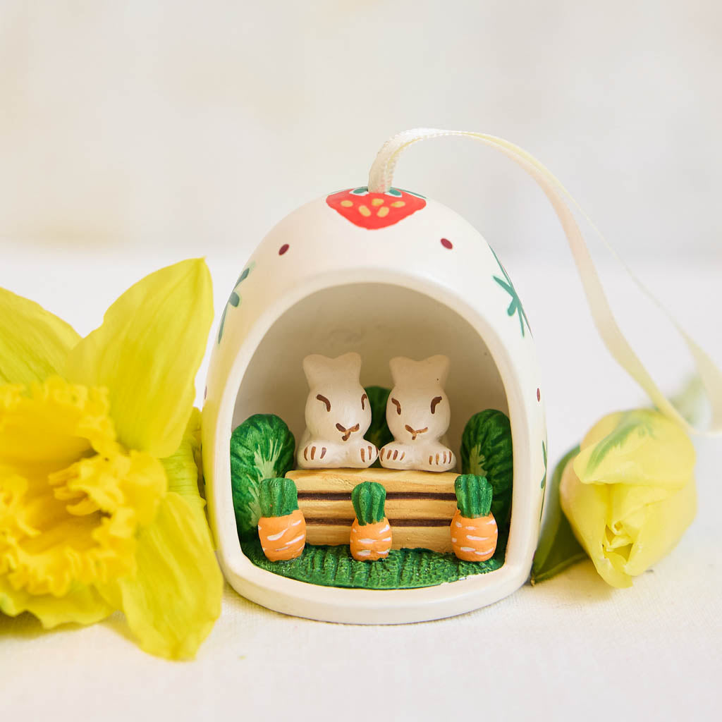 Bunnies in Egg Ceramic Ornament