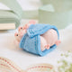 Cozy, cuddly, and completely irresistible—our Pigs in a Blanket Ornament is here to wrap your holidays in pure joy. Featuring a sweet pig parent and baby snuggled snugly inside a soft blue “blanket,” this playful design brings together comfort, humor, and heartfelt connection in the most delightful way.