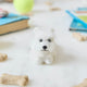 Full of personality and unmistakable charm, our alpaca&nbsp;Westie Ornament brings this beloved breed to life in soft, handcrafted detail. Carefully made by skilled artisans, this adorable pup features the Westie’s signature fluffy white coat, alert expression, and compact, sturdy stance.