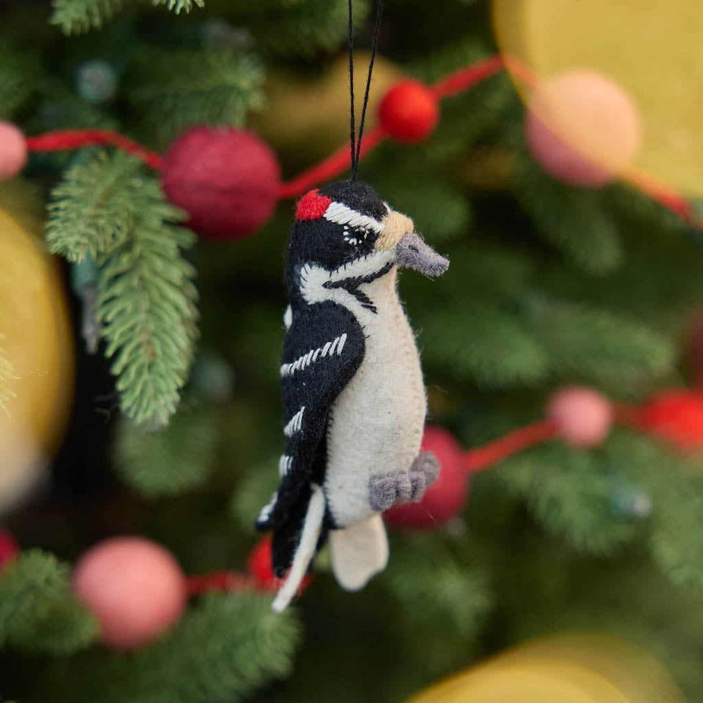 Celebrate the beauty and delicate details of woodland wildlife with this adorable handmade woodpecker ornament, a nature-inspired bird decoration perfect for nature lovers.