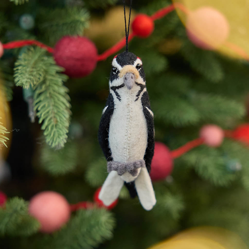 Celebrate the beauty and delicate details of woodland wildlife with this adorable handmade woodpecker ornament, a nature-inspired bird decoration perfect for nature lovers.