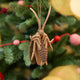 Lovingly needle-felted from natural wool, this tiny explorer features carefully stitched wings, long antennae, and a softly sculpted body that highlights the intricate beauty of this often-overlooked insect. Both realistic and gently whimsical, it invites a closer look at the small creatures that share our world.