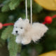 Full of personality and unmistakable charm, our alpaca&nbsp;Westie Ornament brings this beloved breed to life in soft, handcrafted detail. Carefully made by skilled artisans, this adorable pup features the Westie’s signature fluffy white coat, alert expression, and compact, sturdy stance.
