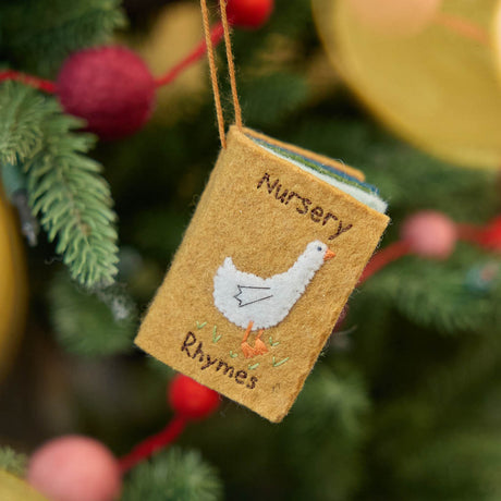 handcrafted miniature nursery rhymes book celebrating classic childhood tunes and stories, ready to hang on the tree or in the nursery! Mother Goose treasury in a handcrafted ornament
