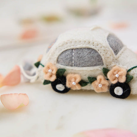 detail shot of “Just Married” wedding car ornament—perfect for newlyweds, bridal showers, and romantic holiday décor.