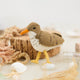 Bring a touch of the shoreline to your holiday décor with our delightful Spotted Sandpiper Ornament. Carefully handcrafted from eco-friendly wool felt, this charming bird captures the distinctive features of the beloved sandpiper, from its warm brown plumage and bright orange beak to its delicate spotted breast.