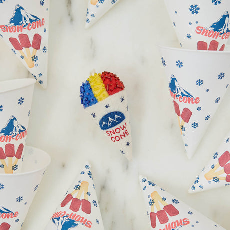 Cool off your Christmas tree with our Summer Snow Cone Ornament, a cheerful felt ornament inspired by one of summer’s most iconic frozen treats. Handcrafted by skilled artisans using traditional felting techniques, this whimsical ornament features a vibrant tri-color snow cone topped with sparkling bead accents that mimic crunchy ice crystals. The detailed white cone is embroidered with classic snow cone graphics and playful lettering, capturing the carefree spirit of amusement parks, beach vacations, and s