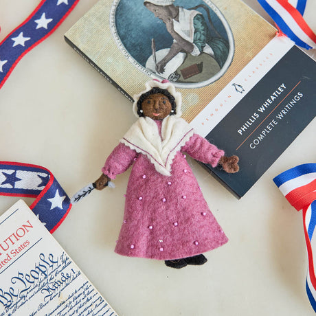 Celebrate the life and literary legacy of an extraordinary American voice with our handcrafted Phillis Wheatley Ornament from the Craftspring Semiquincentennial Collection.