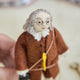 Honor the brilliance and ingenuity of a true American icon with our handcrafted Benjamin Franklin Ornament from the Craftspring Semiquincentennial Collection. Featuring Franklin in his classic colonial attire while flying a kite with a key