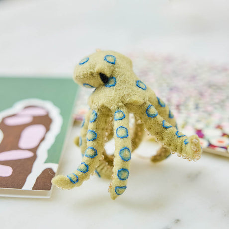 A handcrafted felt Blue-ringed Octopus Ornament inspired by one of Australia's most fascinating and recognizable marine creatures.