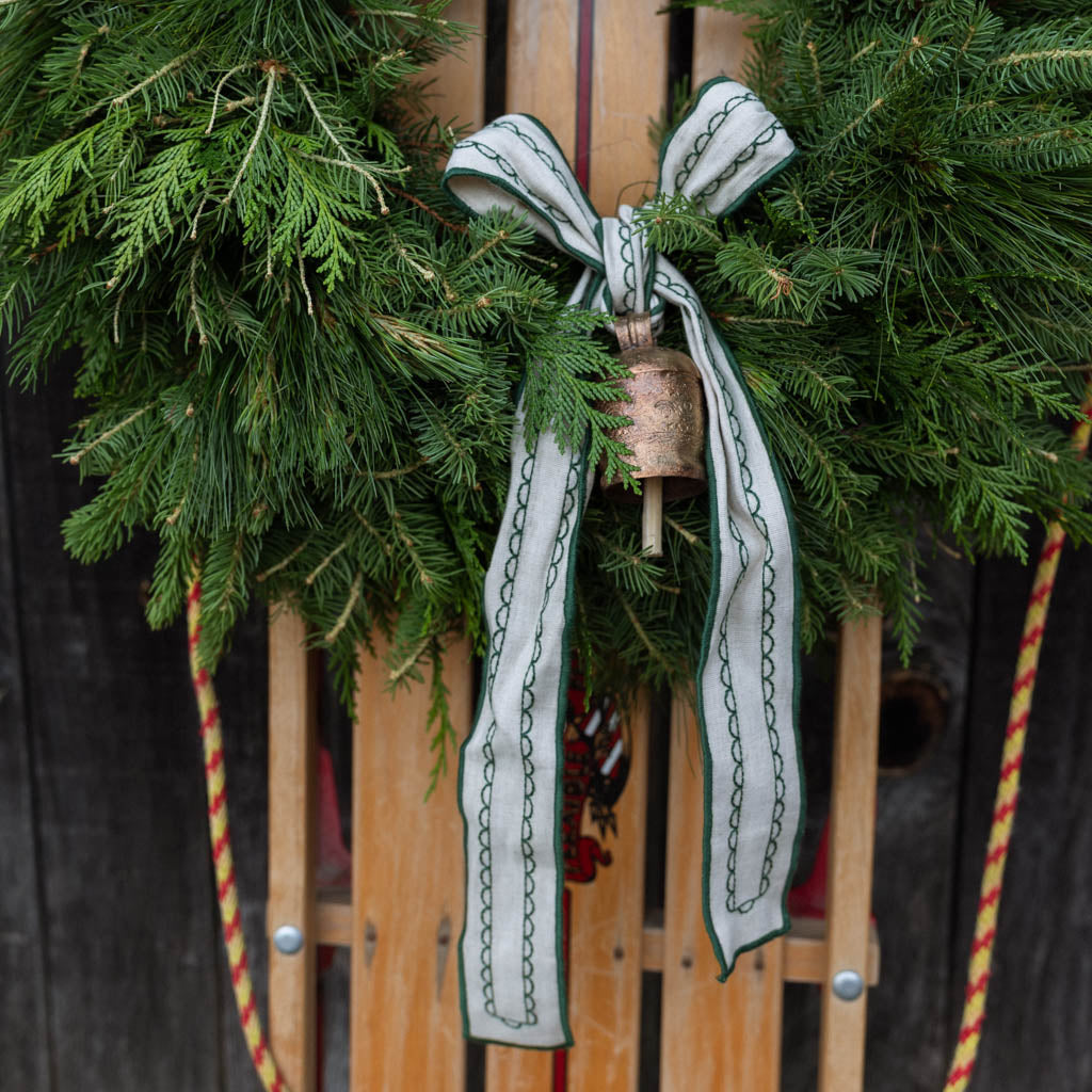 Embossed Bell with Green Ribbon