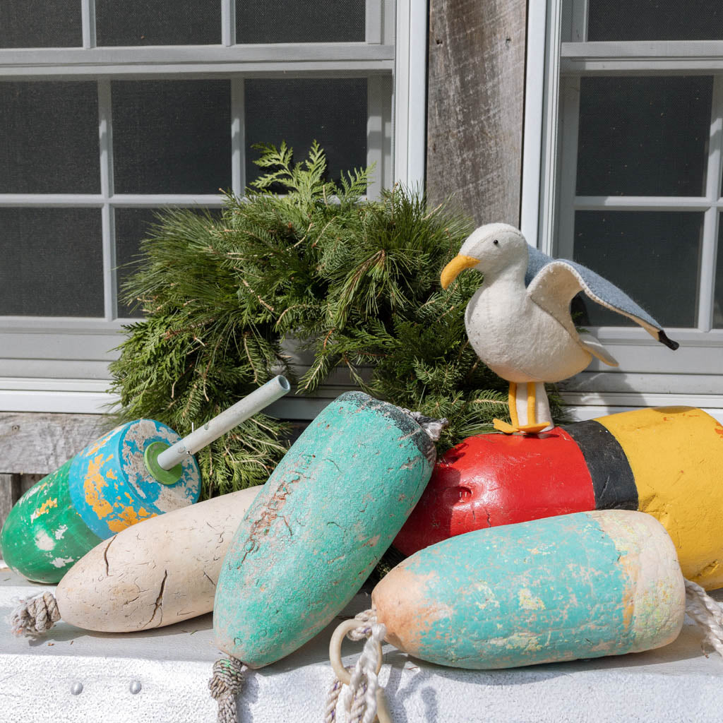 Let your holiday décor take flight with our handcrafted Seagull Tree Topper, a whimsical coastal alternative to the traditional star or angel. With wings fully outstretched, bright yellow legs, and classic black-tipped feathers, this charming seabird captures the freedom and beauty of life by the ocean.