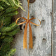 Add a graceful finishing touch to your holiday decor with our Festive Bow Metal Ornament. Beautifully handmade in the Philippines, this classic golden bow is crafted from hand-embossed iron and finished with a softly aged sheen for the look of a treasured vintage decoration.
