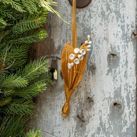 Inspired by vintage botanical treasures, our Lily of the Valley Metal Ornament celebrates the delicate beauty of one of spring’s most beloved flowers.