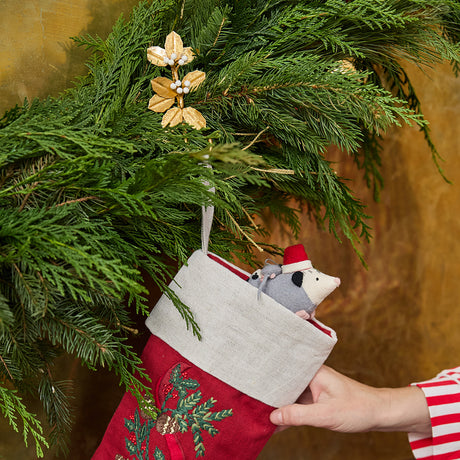 Deck the mantel! Our Holly Metal Stocking Holder turns a holiday essential into a little piece of botanical beauty, with golden holly leaves and clusters of snowy white berries handcrafted in metal.