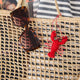 Effortlessly stylish and endlessly versatile, our Raffia Tote Bag is designed for beach days, market strolls, weekend getaways, and everyday adventures. Hand-crocheted from natural raffia fibers, this lightweight tote combines timeless coastal style with practical functionality, creating a beautiful accessory you'll reach for season after season.