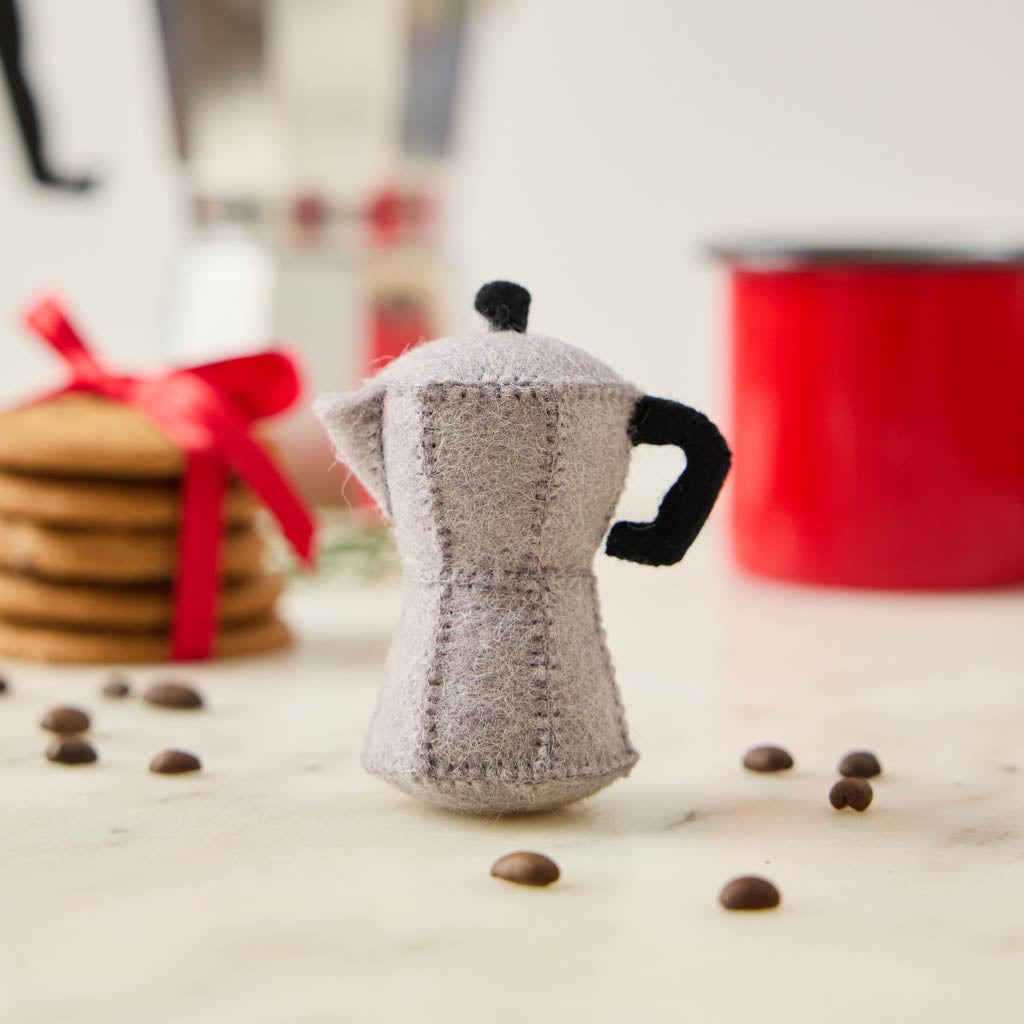 There's nothing quite like that first cup of coffee in the great outdoors. Our Camp Coffee Percolator Ornament is a nostalgic tribute to cozy campsite mornings, crackling campfires, and the comforting ritual of brewing coffee before setting off on the day's adventure.