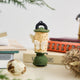 Handcrafted from natural wool felt, this charming vintage-inspired lantern ornament features soft ivory tones accented with shimmering golden beadwork that mimics the gentle glow of lantern light. Delicate felt moths flutter around the lantern, adding a whimsical touch that captures the quiet magic of nature at dusk. 