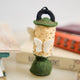 Handcrafted from natural wool felt, this charming vintage-inspired lantern ornament features soft ivory tones accented with shimmering golden beadwork that mimics the gentle glow of lantern light. Delicate felt moths flutter around the lantern, adding a whimsical touch that captures the quiet magic of nature at dusk. 