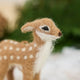 An irresistibly sweet, needle-felted alpaca wool fawn ornament from Peru, featuring delicate white spots, soft fuzzy textures, and lifelike details—bringing the gentle magic of woodland creatures to your Christmas tree.