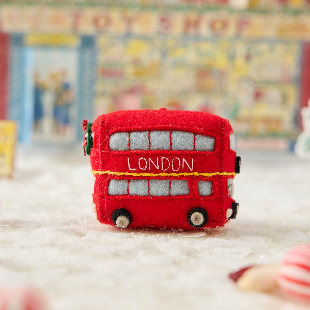 A handmade felt Double Decker London Bus ornament celebrating iconic British landmarks, London adventures, and festive holiday travel.