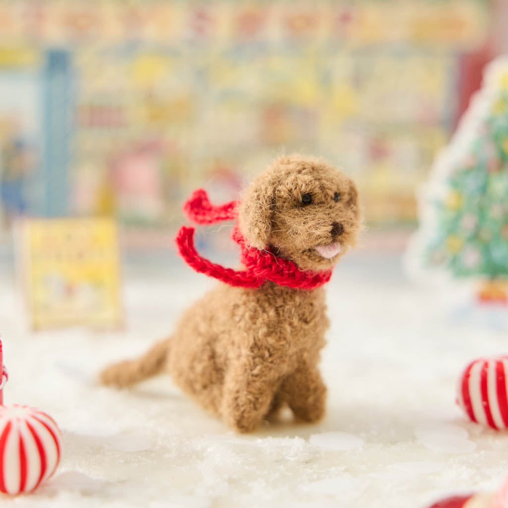 Calling all dog moms, dads, and doodle devotees—your tree just found its new best friend! Our Golden Doodle Ornament is handmade with love in a small workshop in Peru, using the softest, fluffiest felted alpaca wool. One look at those sweet eyes and curly golden fur and you’ll be saying “Good boy!” to your Christmas tree.