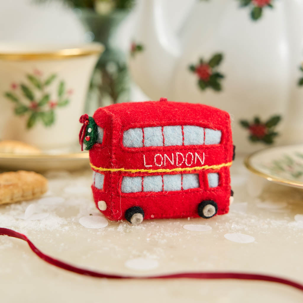 A handmade felt Double Decker London Bus ornament celebrating iconic British landmarks, London adventures, and festive holiday travel.