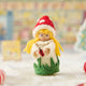 A magical little child of the forest, bringing good fortune, woodland wonder, and a sprinkle of fairy-tale enchantment into your home all year round! This sweet little red Amanita mushroom girl ornaments features a bright red felted mushroom cap, dotted with delicate white spots, and a skirt hemmed with felted green grasses. 