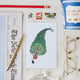 A Little City Mischief, Straight to Your Mailbox! A whimsical illustrated Christmas postcard featuring JG Debray's playful cockroach artwork, created in collaboration with Roaches of NYC and Craftspring.