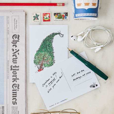  Our Roach-mas Tree Postcard brings a hilarious twist to a beloved holiday tradition, featuring one of New York City's most infamous little residents hauling home a Christmas tree that's just a little too big for the journey!