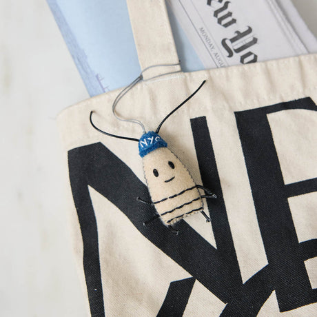 From the sidewalks of New York to your favorite handbag, backpack, or tote, this charming little critter is ready to hitch a ride wherever the day takes you. A hilarious gift for proud New Yorkers, city lovers, and anyone who appreciates the wonderfully weird side of the Big Apple.
