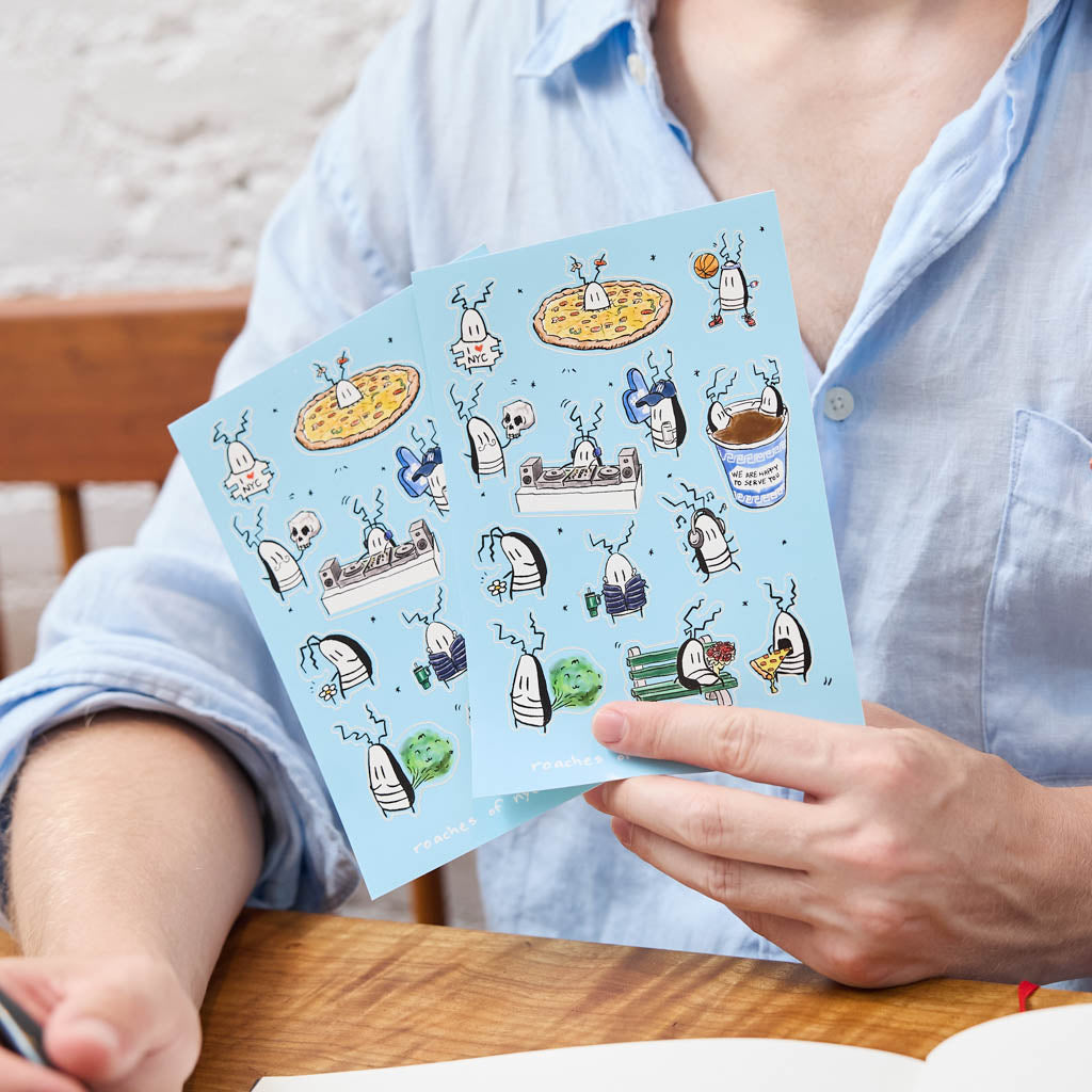 A playful NYC-themed sticker sheet featuring illustrated cockroach characters by artist JG Debray, created in collaboration with Roaches of NYC and Craftspring.